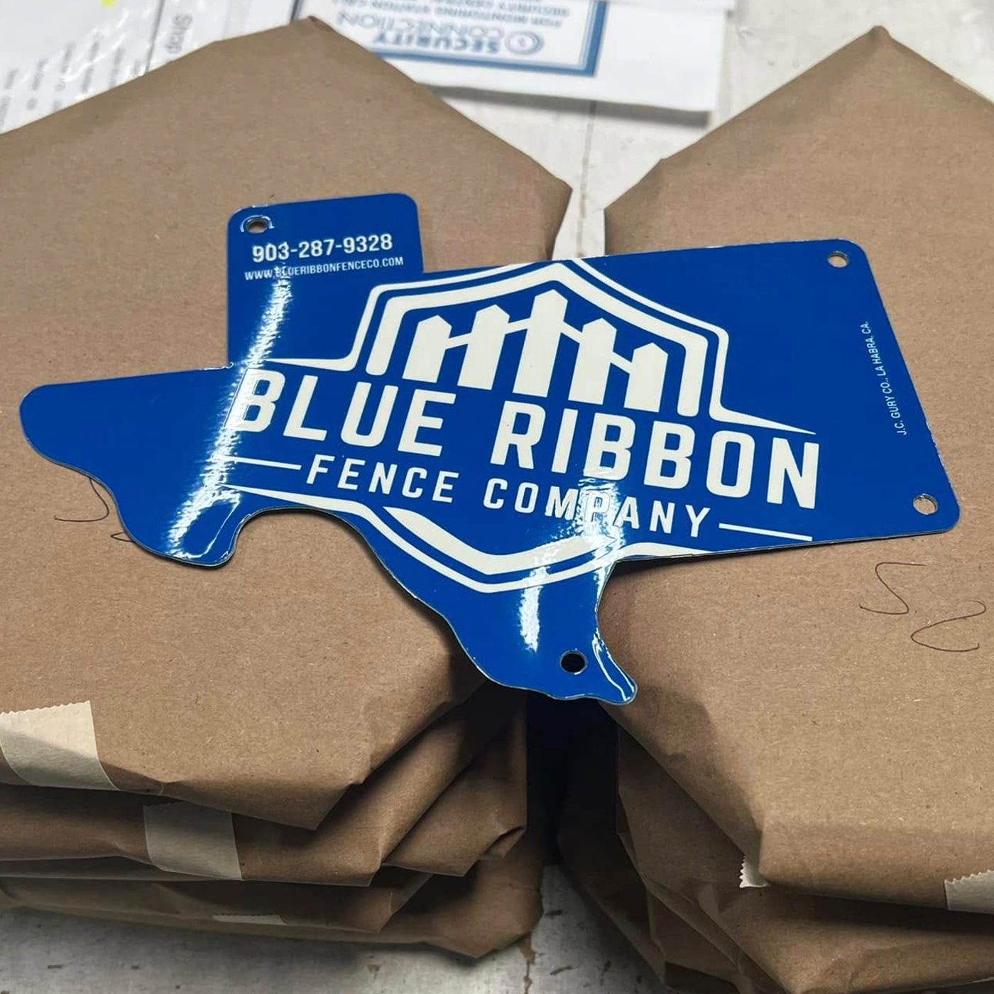 Custom fence sign example - Blue Ribbon Fence Company